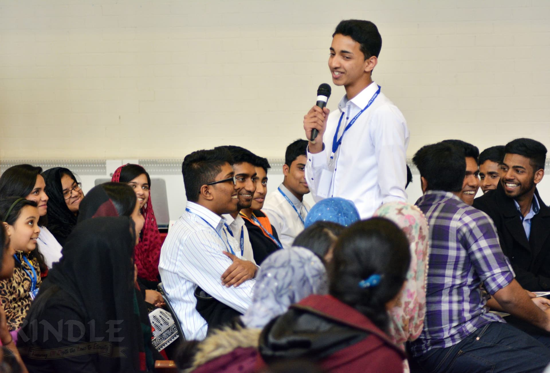 KINDLE youth camp attendees worshipping and growing together